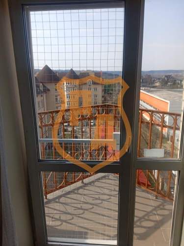 решетка антикошка на балконную дверь